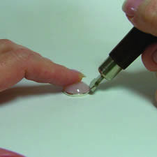 Cabochon being held in a bezel setting